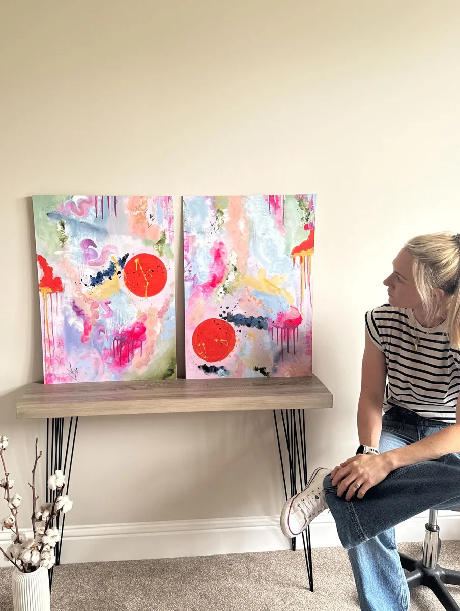 Rach at a table with two new abstracts